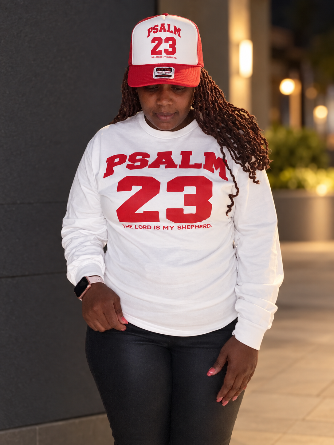 Psalm 23 white long-sleeve shirt styled with the matching red-white trucker hat